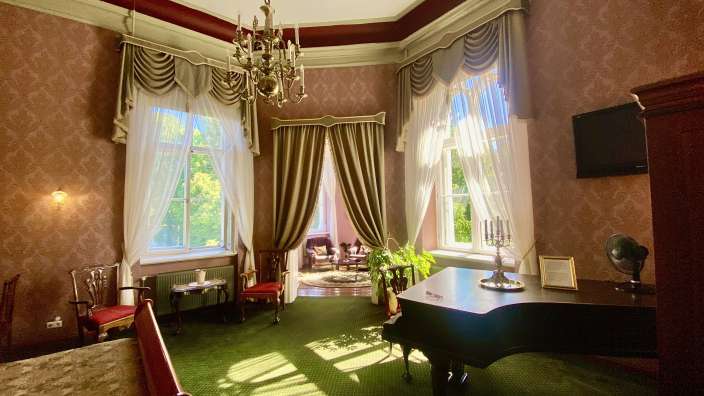 Unser Zimmer im Schloss mit Flügel.